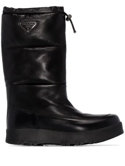 Shop Prada Leather Moon Boots In F0002  Nero