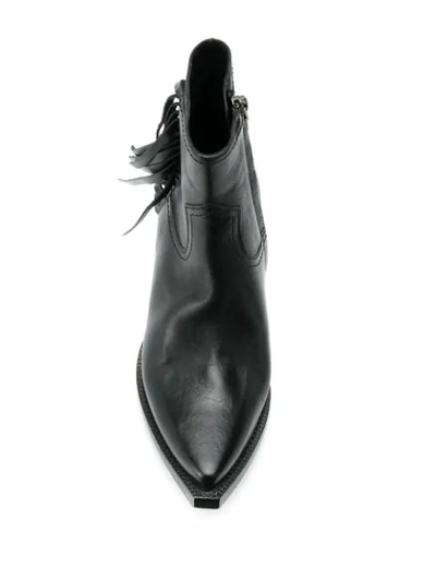 Shop Saint Laurent Lukas Fringed Boots In Black
