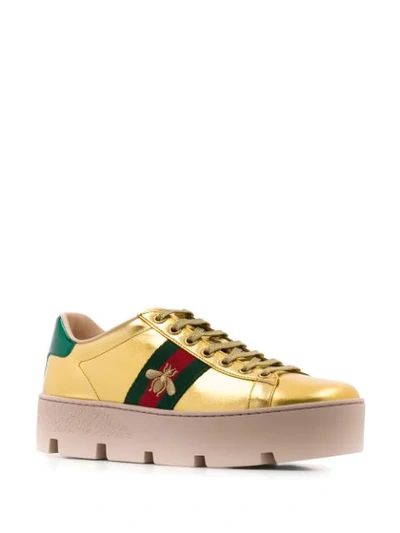 Shop Gucci Ace Embroidered Platform Sneakers In Gold