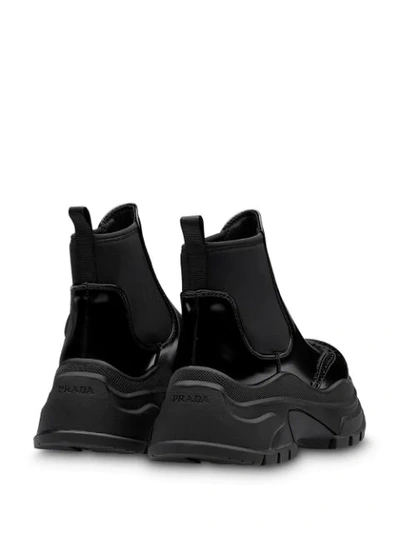 Shop Prada Stiefeletten Mit Sneaker-sohle In F0002 Black