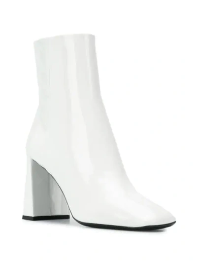 Shop Prada Square Toe Ankle Boots In White