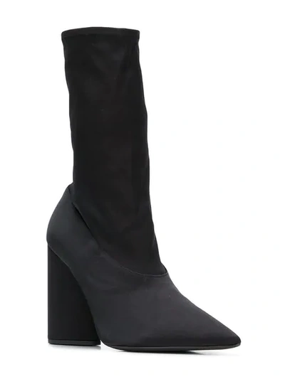 Shop Yeezy Pointed Block Heel Sock Boots In Black