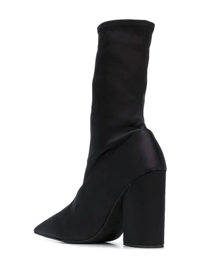 Shop Yeezy Pointed Block Heel Sock Boots In Black
