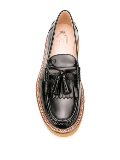 Shop Tod's Tassel Detail Loafers In Black