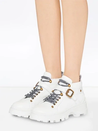 Shop Miu Miu Leather Booties In White