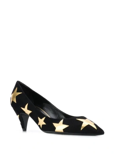 Shop Saint Laurent Star Print Pumps In Black