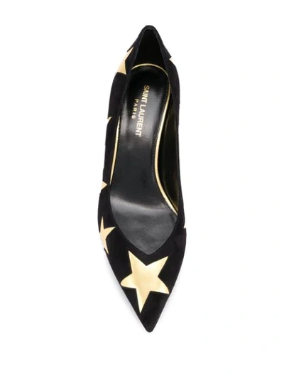 Shop Saint Laurent Star Print Pumps In Black