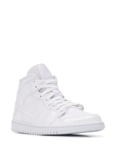 Shop Nike Air Jordan 1 Mid Sneakers In White