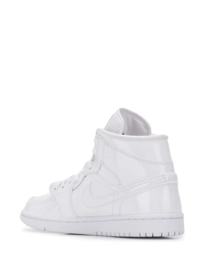 Shop Nike Air Jordan 1 Mid Sneakers In White