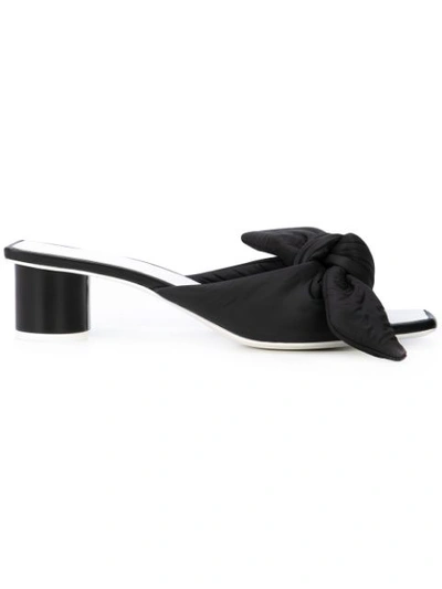 Shop Jil Sander Bow Embellished Mules In Black