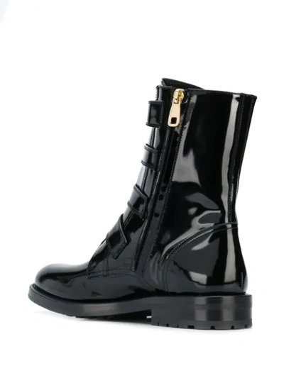 Shop Dolce & Gabbana Brooch Buckle Boots In Black