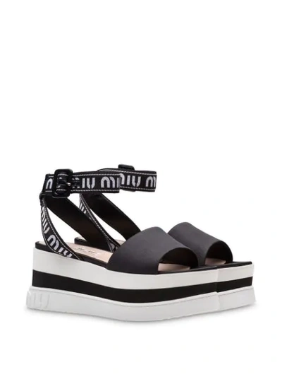 Shop Miu Miu Flatform Sandals In Black