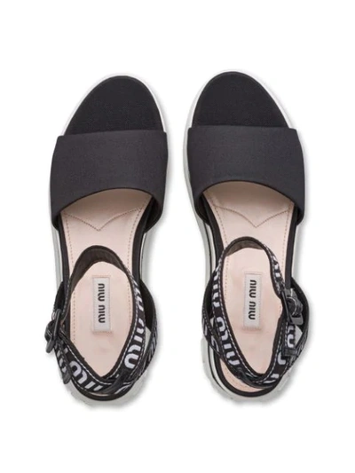 Shop Miu Miu Flatform Sandals In Black