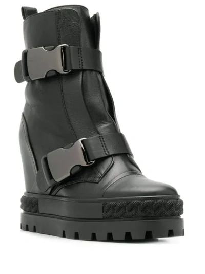Shop Casadei Buckled Wedge Boots In Black