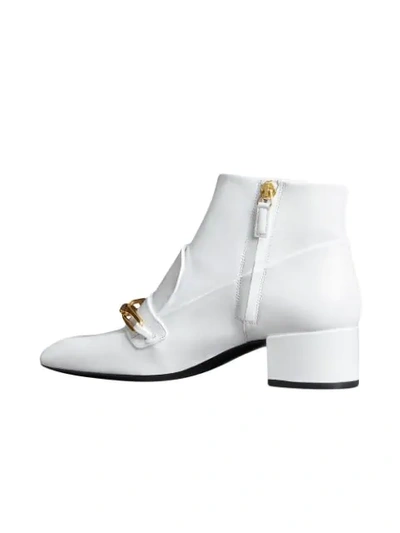 Shop Burberry Link Buckle Ankle Boots In White