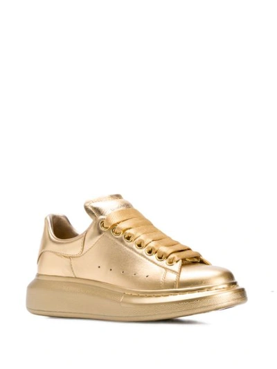 Shop Alexander Mcqueen Oversized Metallic Sneakers In Gold