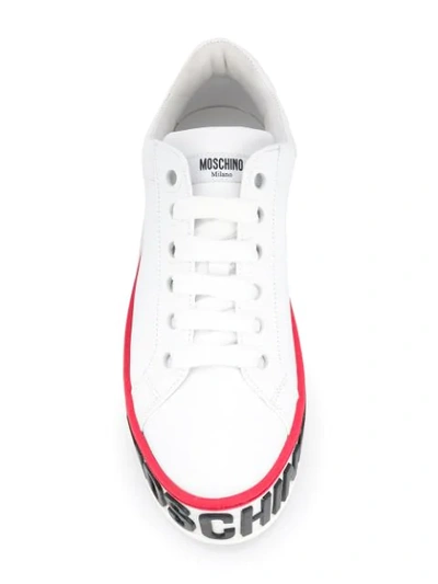Shop Moschino Logo Sole Sneakers In White