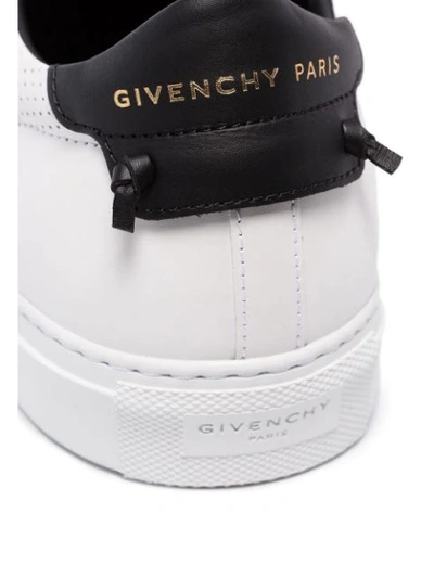 Shop Givenchy Perforated Logo Sneakers In White