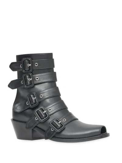 Shop Burberry Buckled Leather Peep-toe Ankle Boots In Black