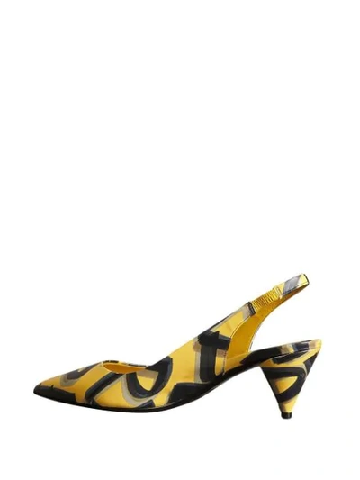 Shop Burberry Graffiti Print Sling In Yellow