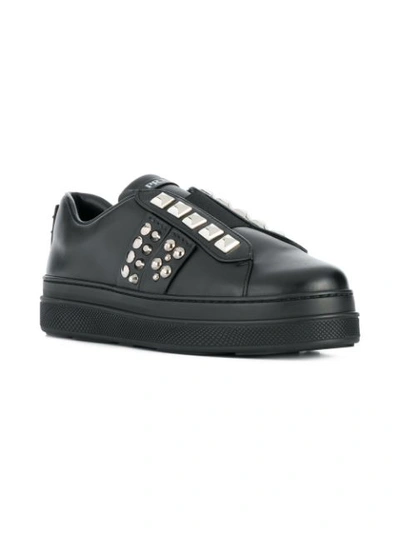 Shop Prada Studded Sneakers In Black