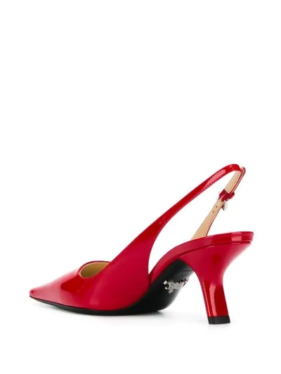 Shop Prada Glossy Slingback Pumps In F0011