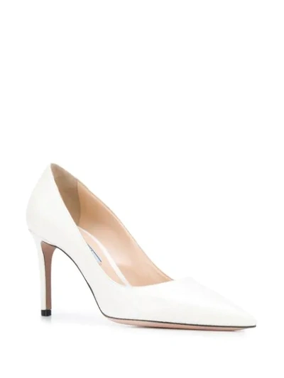 Shop Prada Embossed Pointed Toe Pumps In White