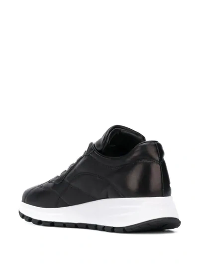 Shop Prada Prax 01 Leather Sneakers In Black