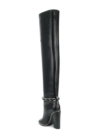 chain-embellished boots