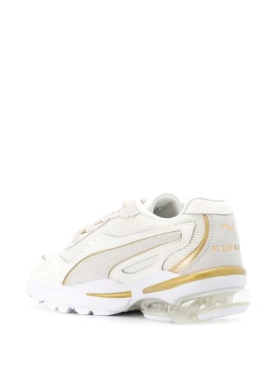 Shop Puma Team Gold Sneakers In White