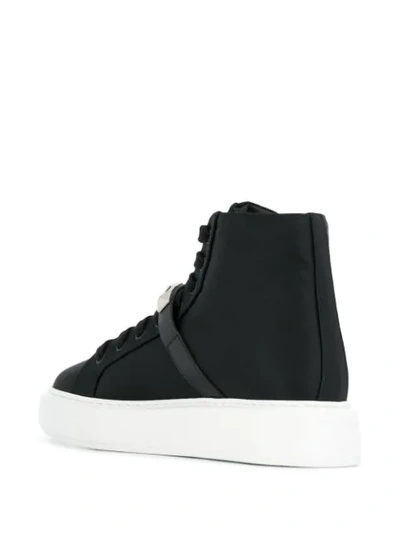 Shop Prada Studded Strap Sneakers In Black