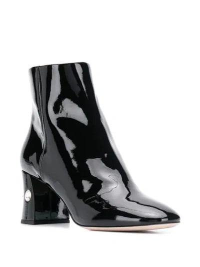 Shop Miu Miu Crystal Embellished Boots In F0002 Nero