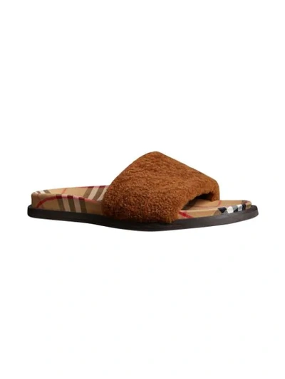 Shop Burberry Shearling And Vintage Check Slides In Brown