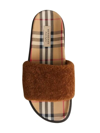 Shop Burberry Shearling And Vintage Check Slides In Brown