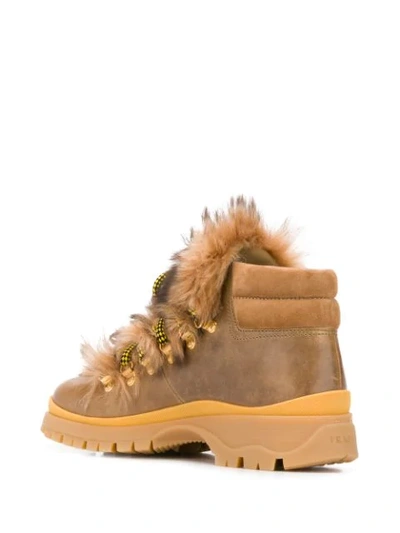 Shop Prada Shearling Ankle Boots In F0018