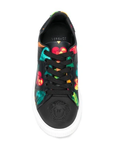 Shop Versace Heart Print Low Top Sneakers In Black