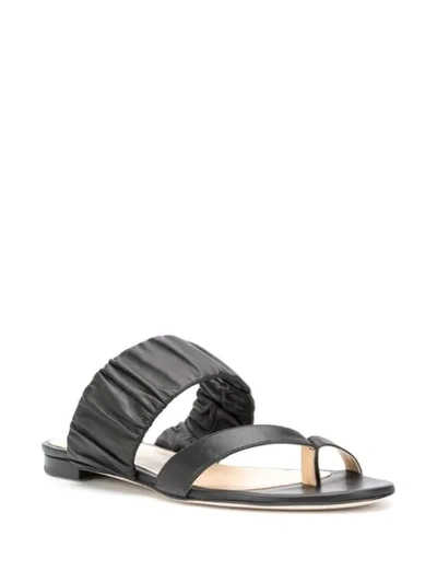 Shop Chloe Gosselin Emiliana Toe-post Sandals In Black