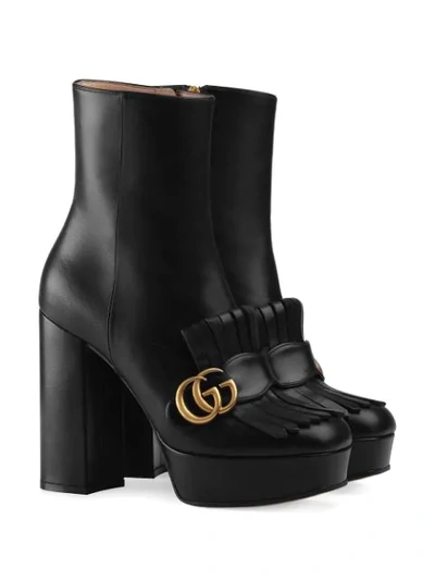 Shop Gucci Leather Ankle Boot With Plateau And Fringe  In Black