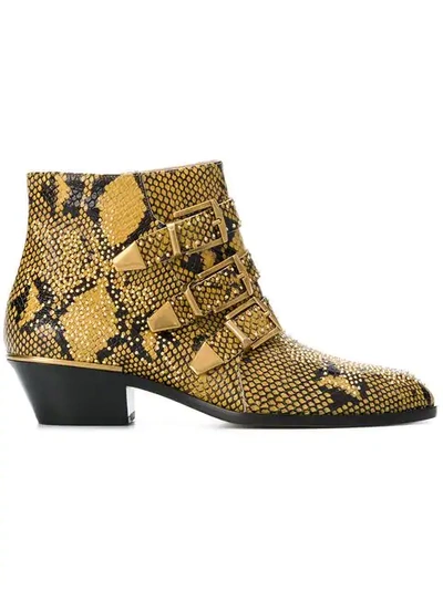 Shop Chloé Susanna Python Print Boots In Yellow ,black