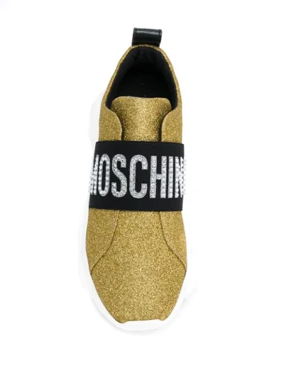 Shop Moschino Logo Glitter Sneakers In Gold