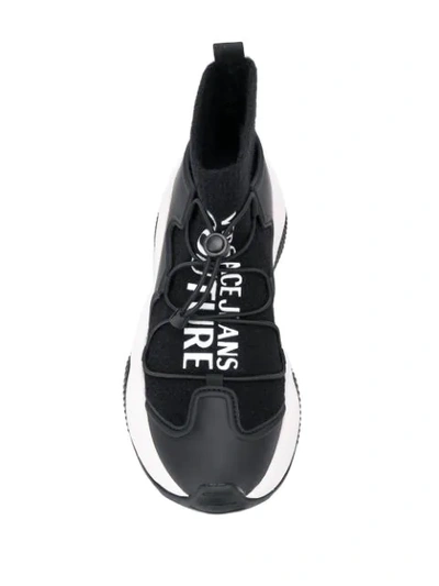 Shop Versace Sock Style Panelled Sneakers In Black