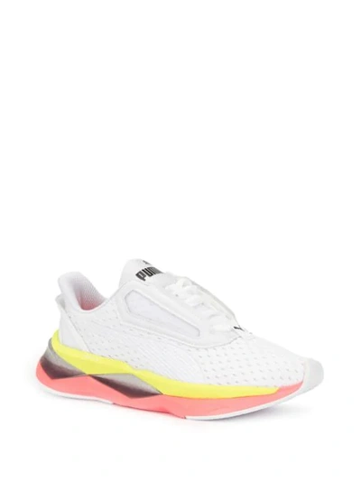 Shop Puma Shatter Sneakers In White