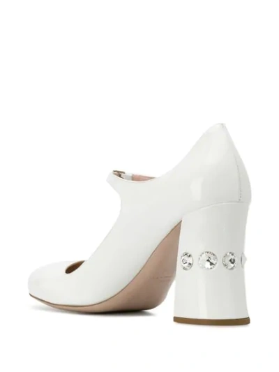 Shop Miu Miu Embellished Heel Mary Jane Pumps In White