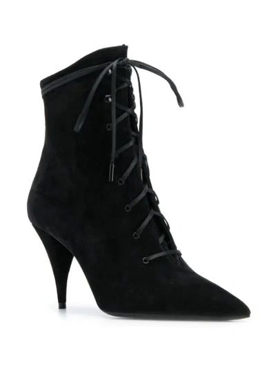 Shop Saint Laurent Kiki Laced Ankle Boots In Black
