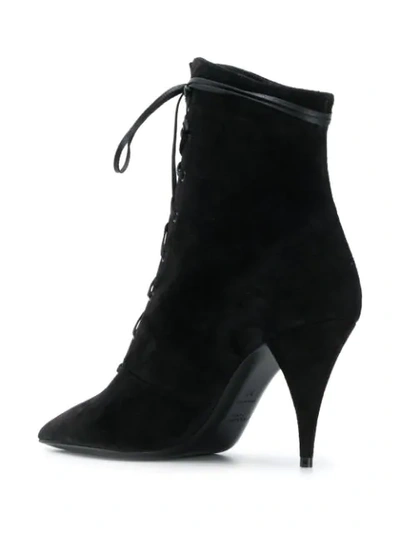 Shop Saint Laurent Kiki Laced Ankle Boots In Black