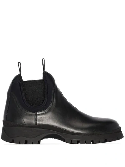 Shop Prada Round Toe Boots In Black