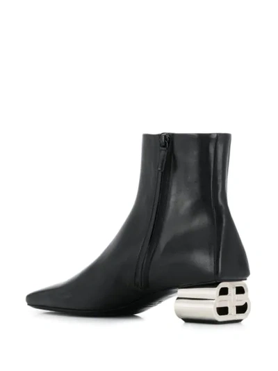 Shop Balenciaga Metallic Bb Logo Block Heel Boots In Black