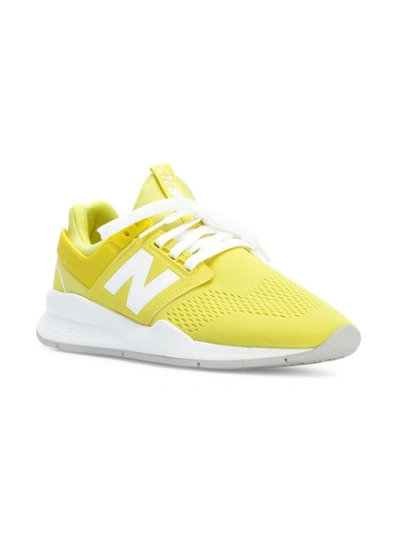 Shop New Balance 247 V2 Lifestyle Sneakers - Yellow