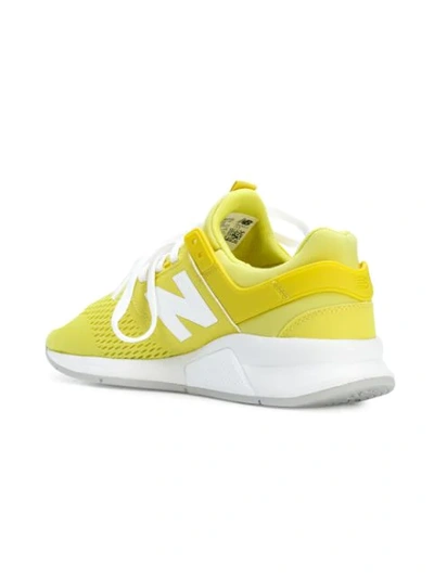 Shop New Balance 247 V2 Lifestyle Sneakers - Yellow