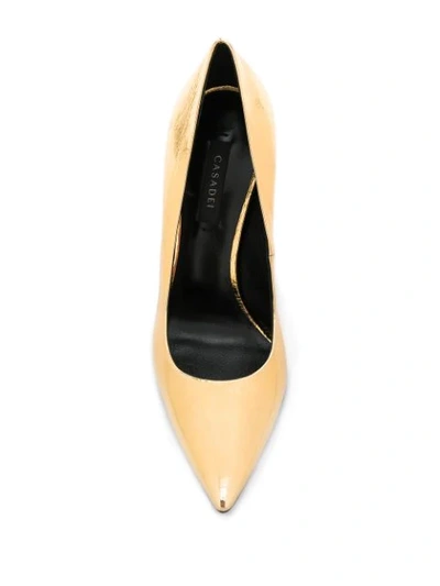 Shop Casadei Metallic Pointed Toe Pumps In Gold